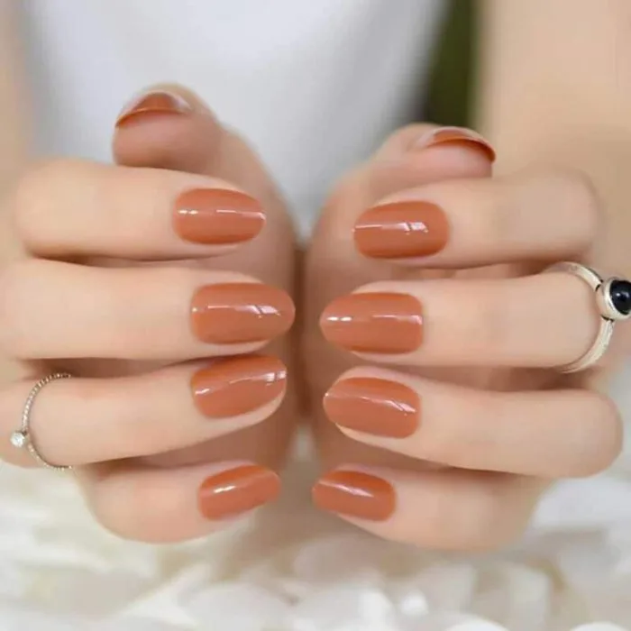 Sơn móng tay màu cam đất có những màu nào? Phù hợp với tông da nào? |  websosanh.vn