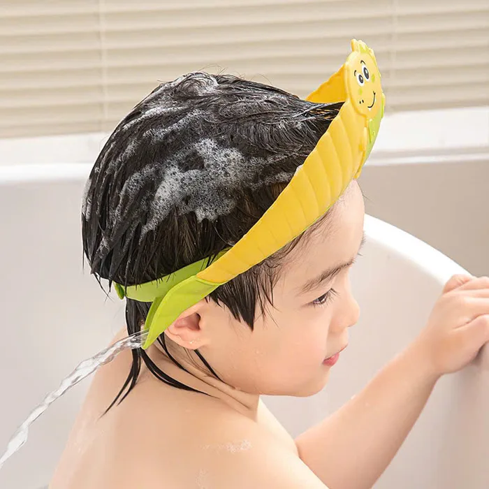 Mũ gội đầu chắn nước họa tiết khủng long Chibi (màu ngẫu nhiên)