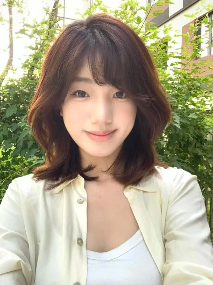 Top 20+ kiểu tóc xoăn sóng lơi ngang vai cực xinh cho nàng